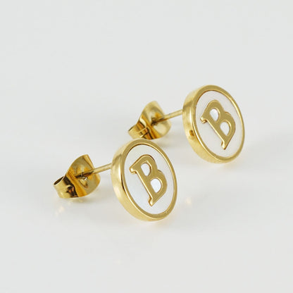 Oorringen met initialen "Vintage"